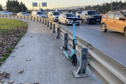 Tır ile bariyer arasında kalan skuter sürücüsü yaralandı